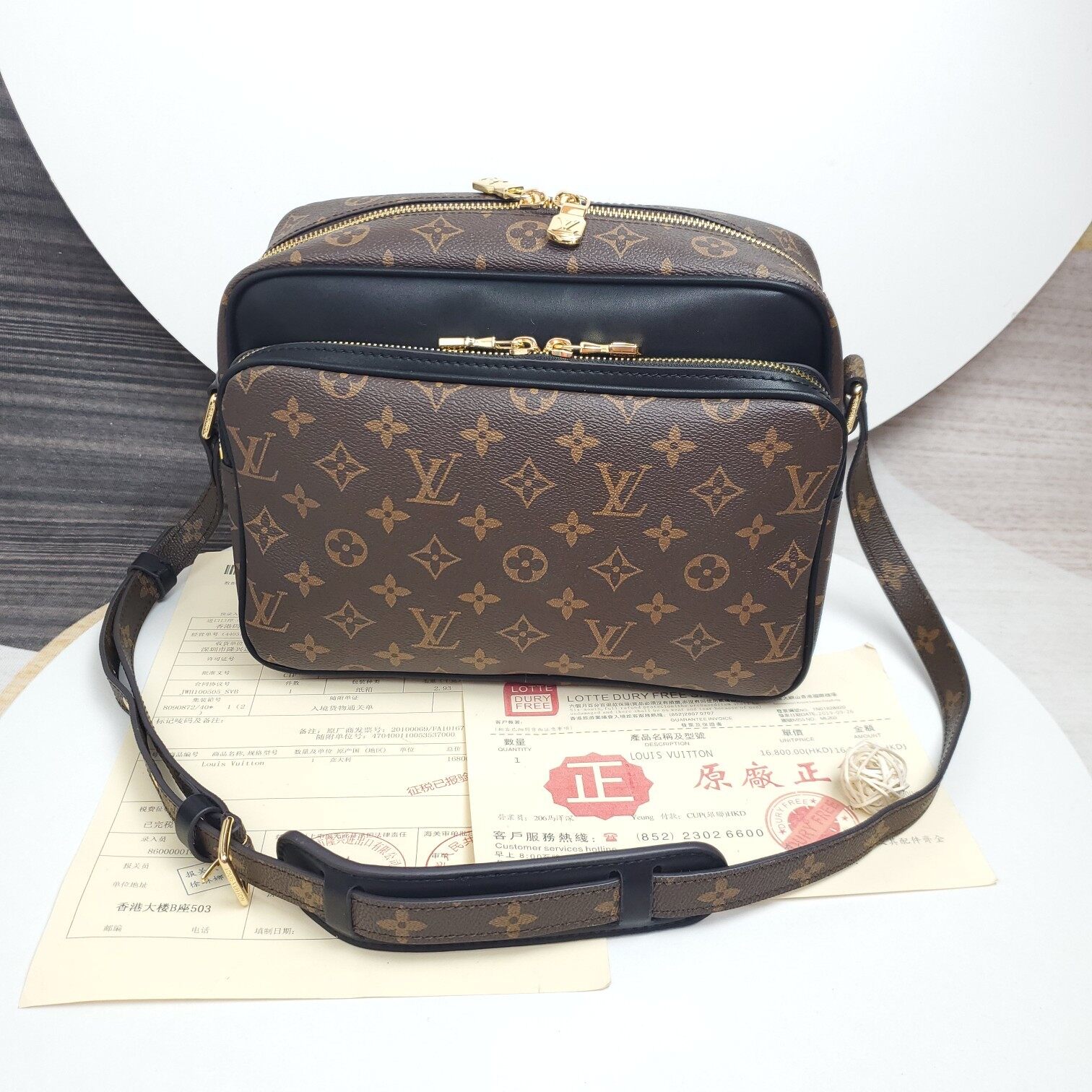 lv postman bag