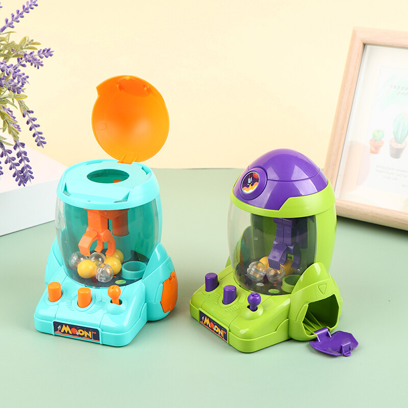 Ministar máy vuốt búp bê mini tên lửa vũ trụ cho trẻ em đồ chơi bóng máy kẹo trò chơi quà tặng cho trẻ em