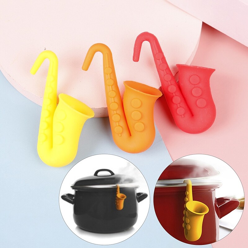 Gambar 1 Piece Silicone Cute Design Spill proof Pot Lid Rack Creative Overflow Stoppers Pot Cover Lifter For Kitchen