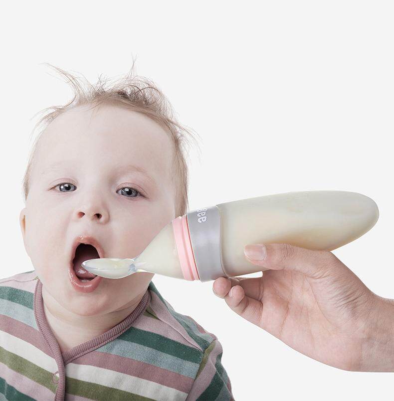 feeding baby cereal in bottle