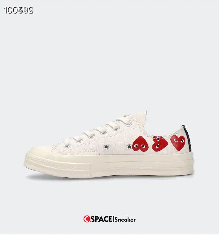 converse with red heart on side