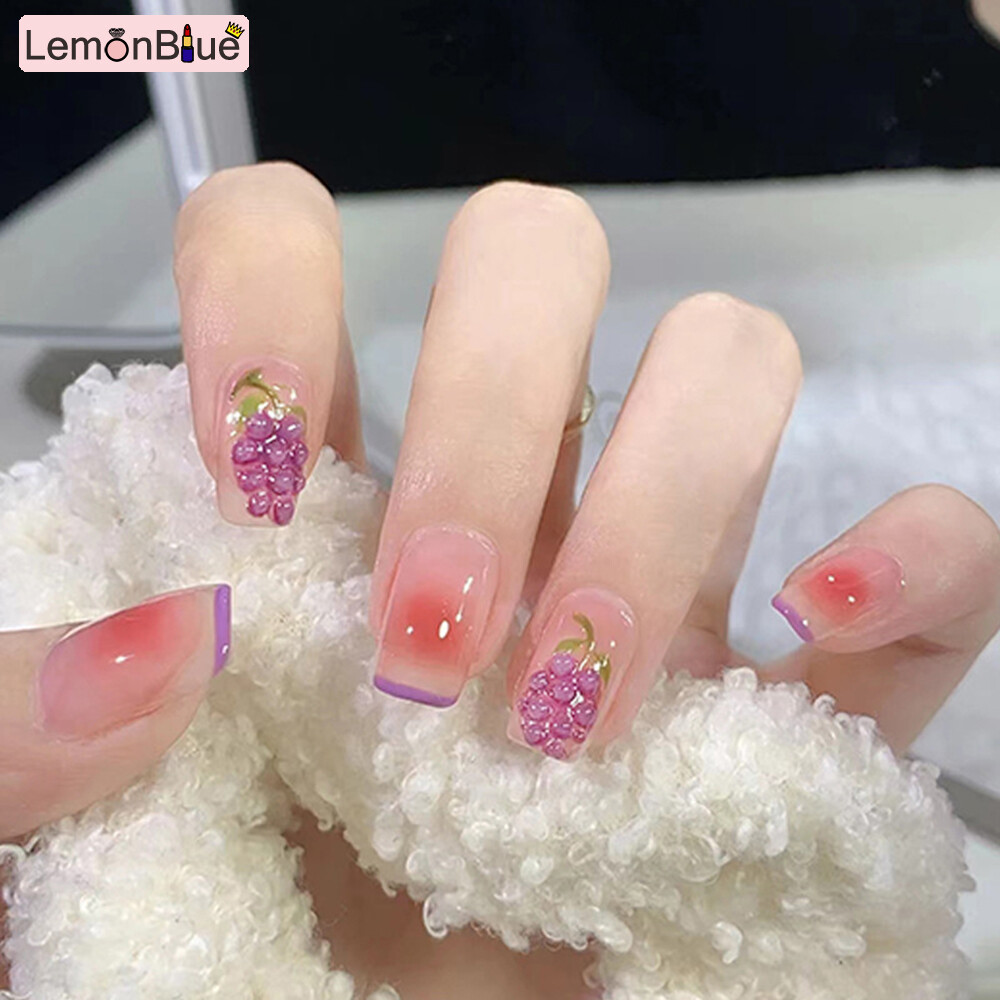 Gambar LemonBlue 24Pcs Glitter Grape False Nails Blush Short Fake Nails for Women and Girls Artificial Nails Fake Nail Pieces Fake Nail Patch Press on Nails Easy Tear Not Fall Nail Art Salon Finger Toes DIY Manicure French Style Full Cover Nail Sticker