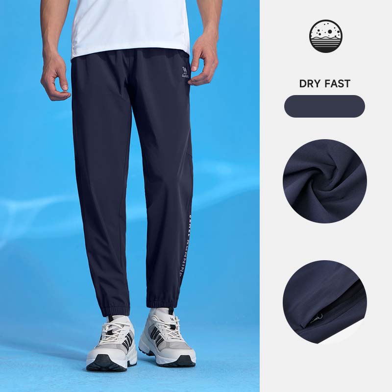 Camel men's thin quick dry sports pants breathable zipper pockets pants ราคา 580 บาท*ส่งฟรี