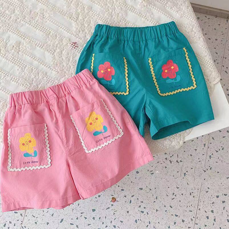 Quần đùi nữ phiên bản Hàn Quốc nhỏ tươi trẻ em lỏng lẻo và thoáng khí mùa hè quần nóng trong xu hướng quần thường ngày linh hoạt của trẻ em