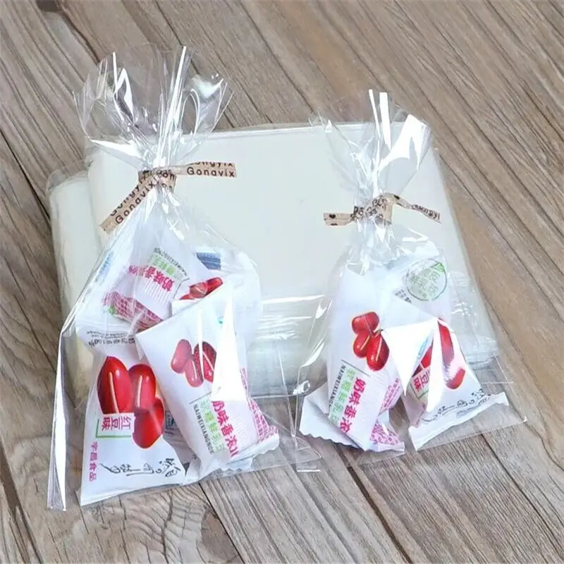 100PCS Pretty Pattern Gift Bag Plastic Jewelry Bag Party Wedding For Sale TO
