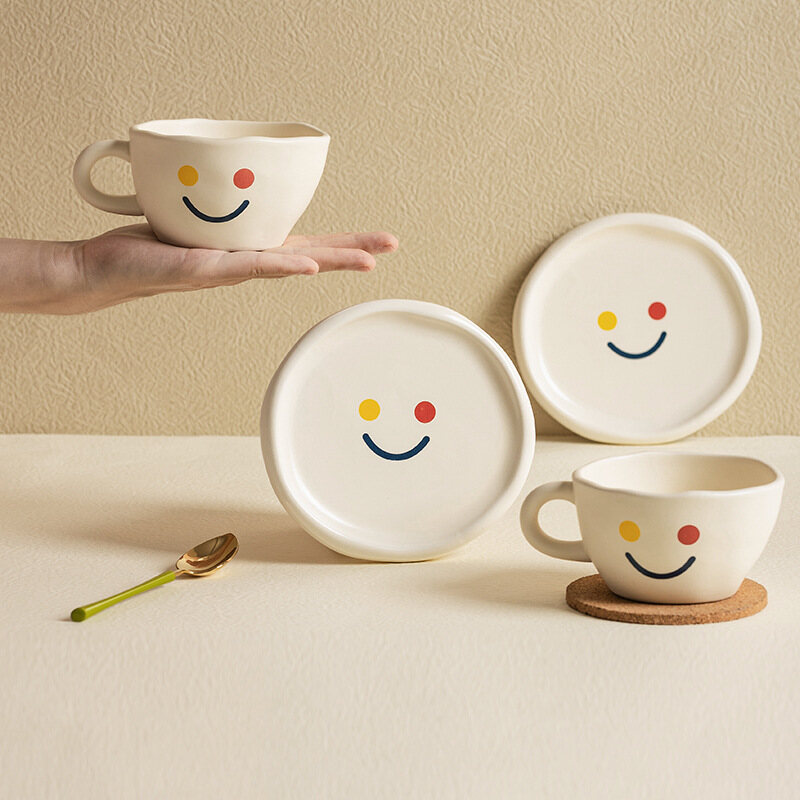 Gambar Ins Style Hand Pinch Smile Ceramic Coffee Cup Afternoon Flower Tea Cup and Saucer Set High Value Mug Breakfast Cup