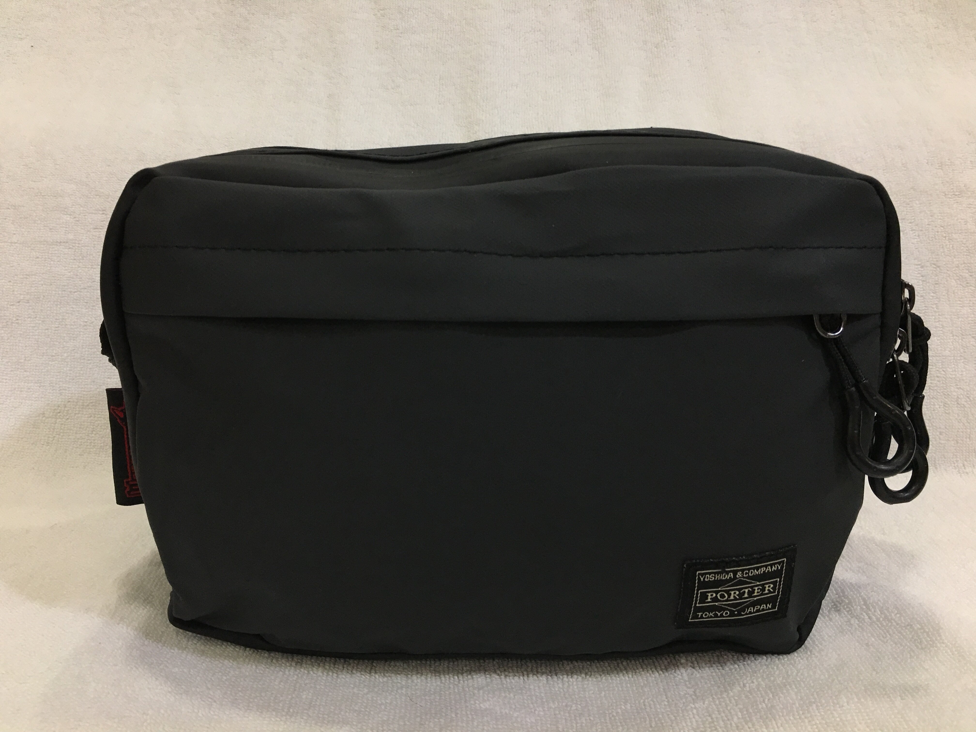 head porter sling bag