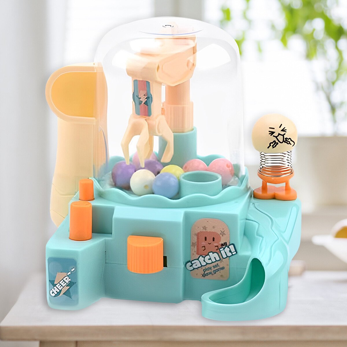 Máy vuốt mini đồ chơi máy gắp bóng thu nhỏ máy gắp viên nang làm quà tặng cho trẻ em