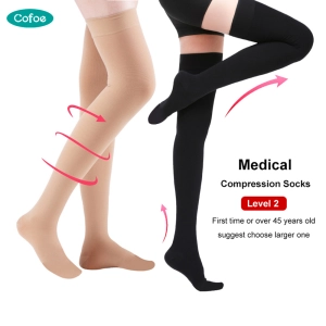 ภาพหน้าปกสินค้าCofoe 1คู่ทางการแพทย์ต้นขาถุงเท้าการบีบอัดระดับ2เส้นเลือดขอดไหลเวียนถุงเท้า23-32 MmHg ความดันห่อนิ้วเท้ายืดหยุ่น Leggings ถุงน่องการบีบอัดสำหรับผู้ชายผู้หญิงป้องกันเส้นเลือดขอดกำจัดอาการบวมน้ำ ที่เกี่ยวข้อง