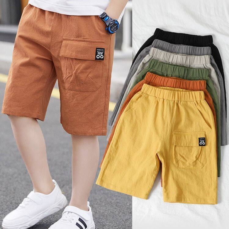 Quần lưng thun màu trơn quần đùi cotton trơn có túi dài đến đầu gối cho bé trai
